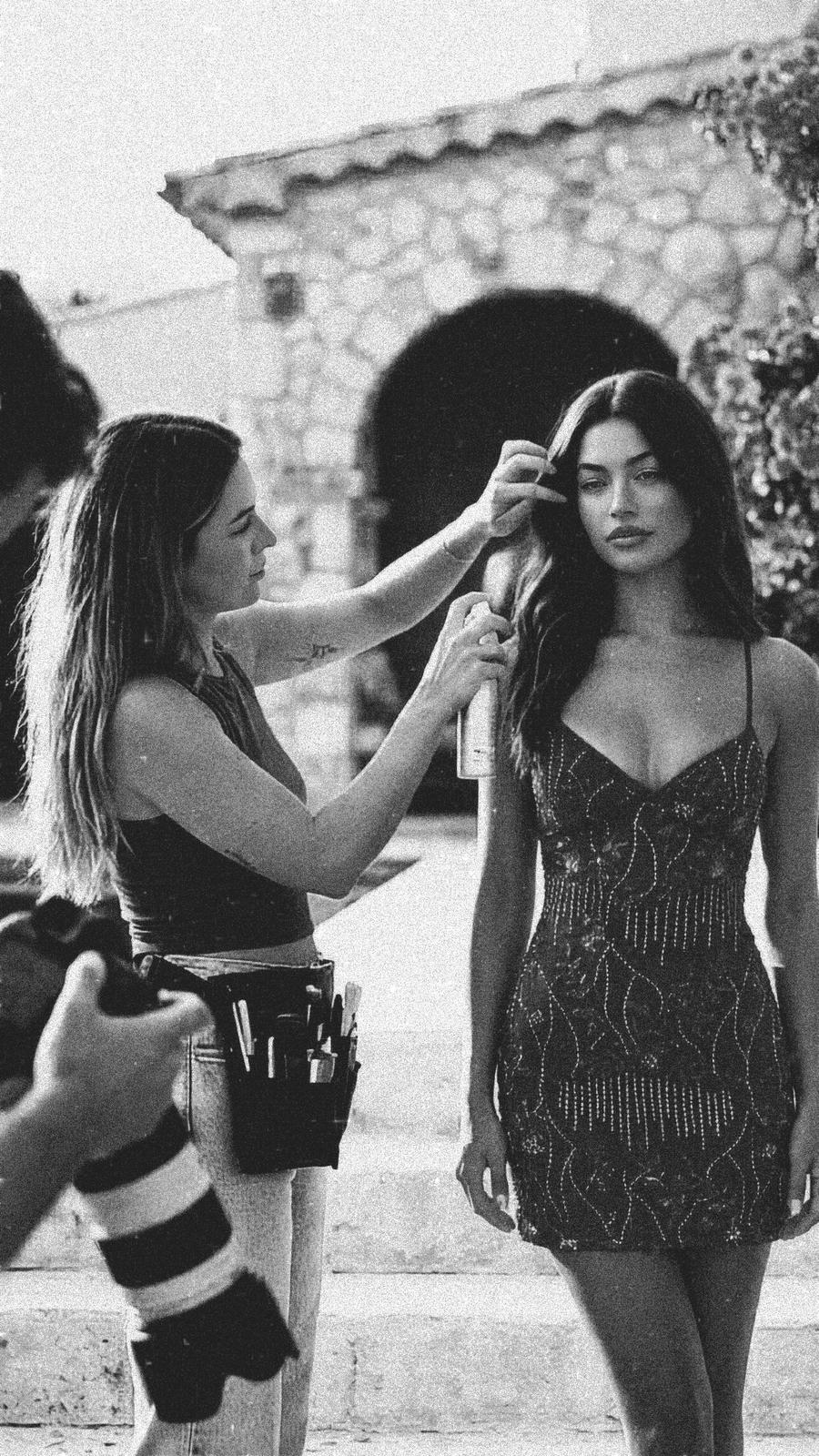Behind the scenes — hair styling on set in black and white
